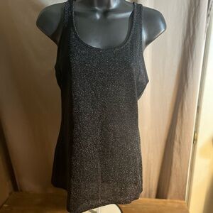 Express shimmer tank top in black. I see small.